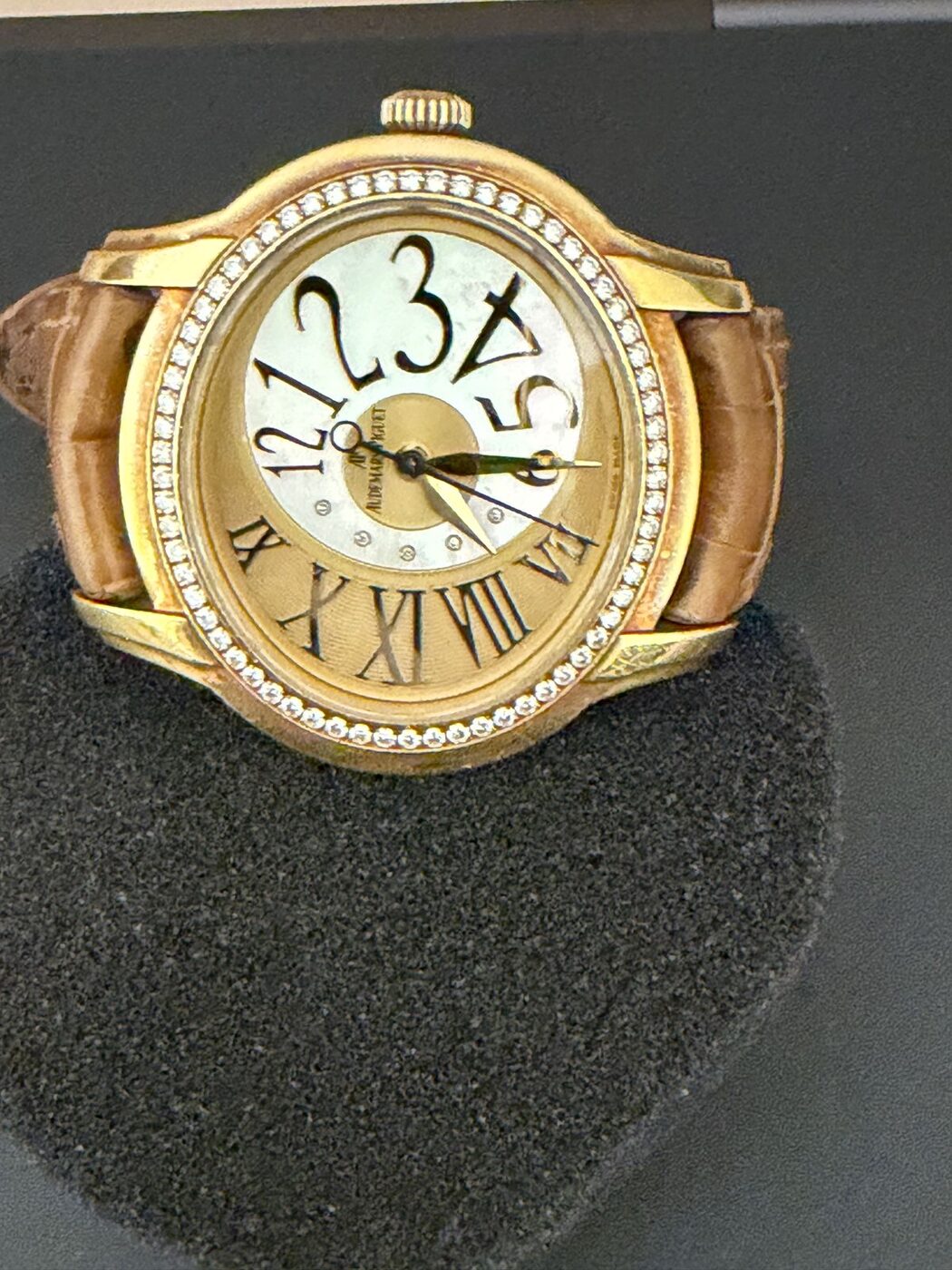 Audemars Piguet Millenary, oval rose-gold case with diamond bezel